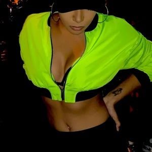 Zara neon yellow cropped zip up jacket.